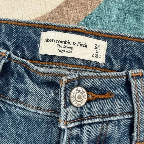 Abercrombie & Fitch | The Skinny High Rise Dark Wash Distressed Cutoff Hem Jeans - Picture 5 of 6